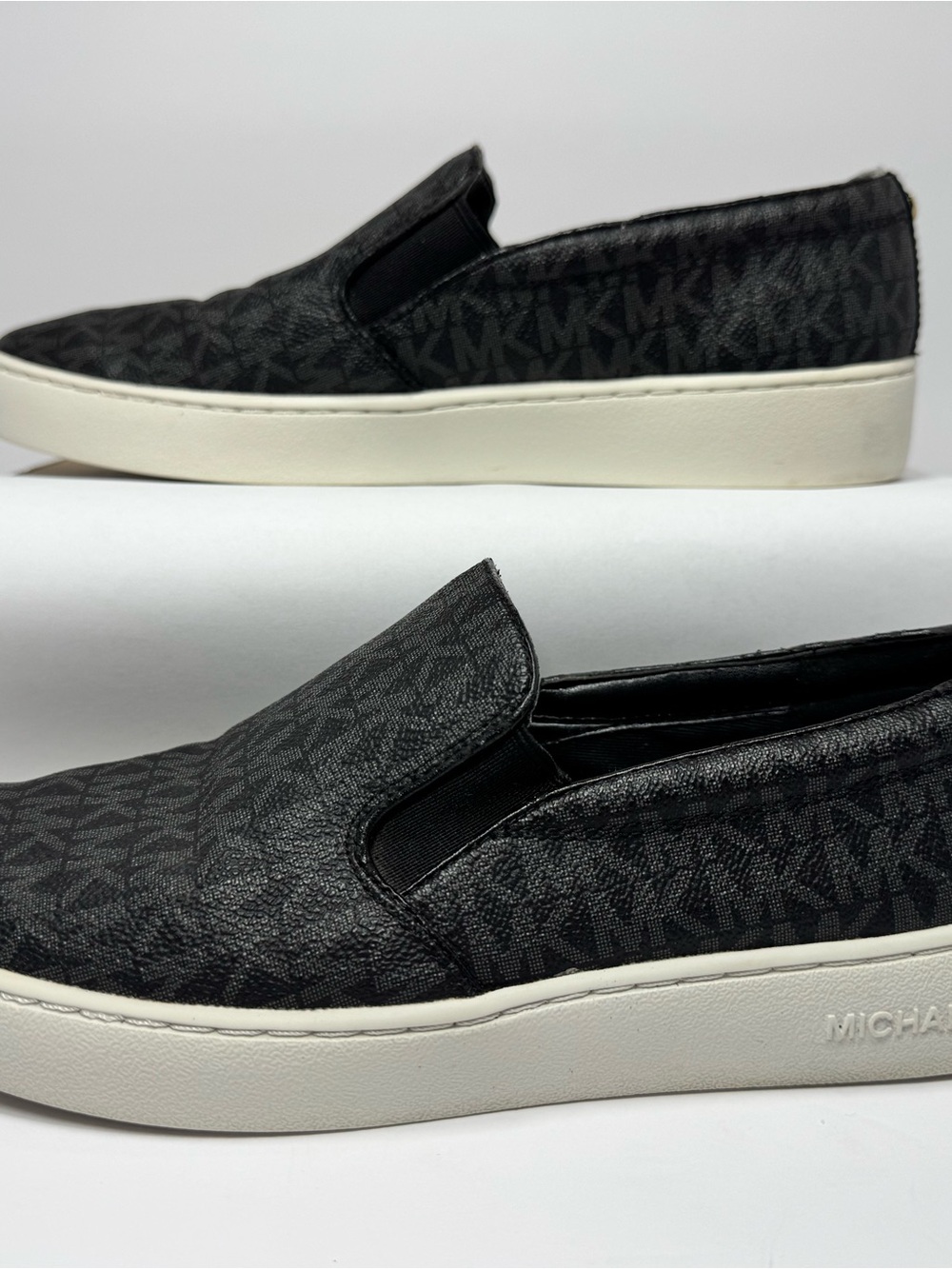 Michael Kors Black Monogram Slip-On Sneakers with White Platform woman’s size 8m